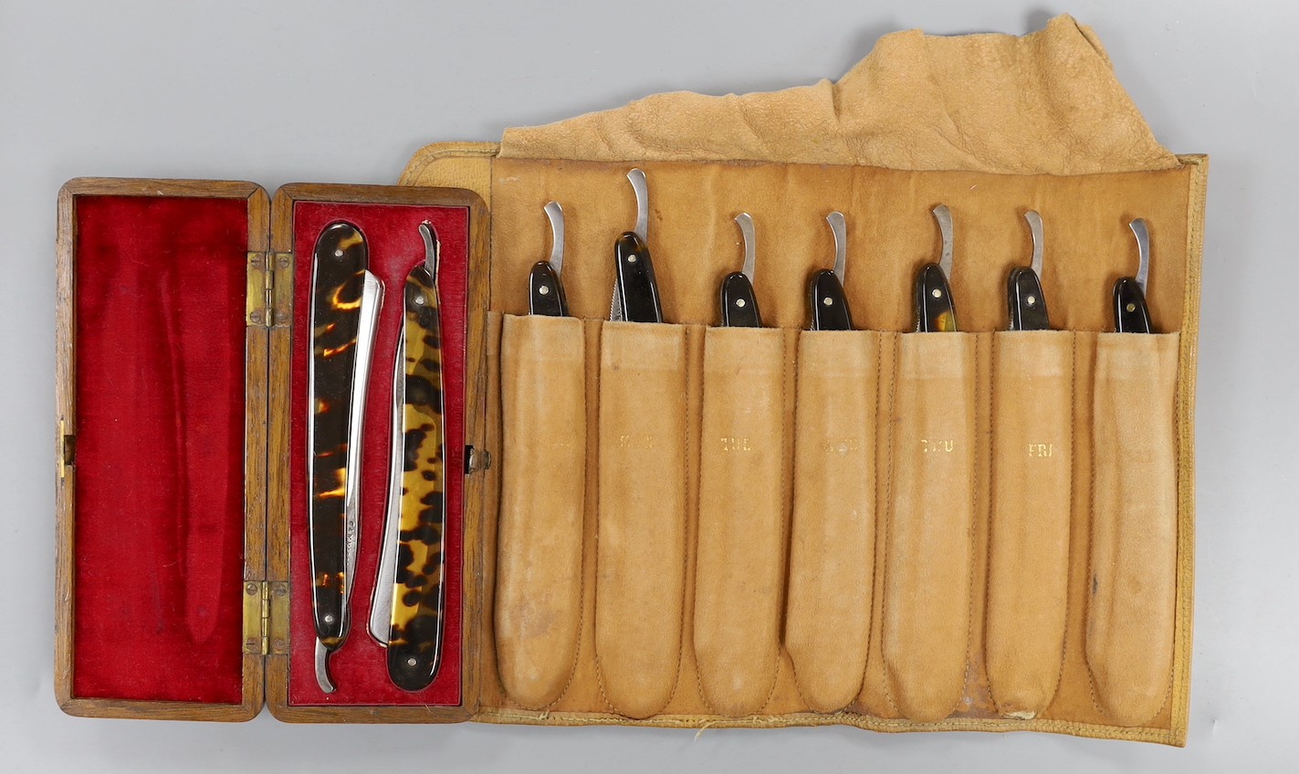 A set of seven tortoiseshell handled cut throat razors for the days of the week Wilkinson and a cased pair of tortoiseshell handled razors, C&W Higginbottom